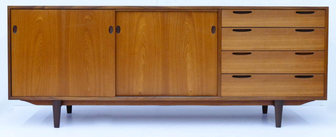 Denmark Mid Century Teak Sideboard 30''x79''x18''. Two: Denmark Mid Century Teak Sideboard 30''x79''x18''. Two sliding doors with four drawers. Unmarked, but accompanied the collection of Peter Hvidt and Arne Vodder furniture. Overall excellent condition.