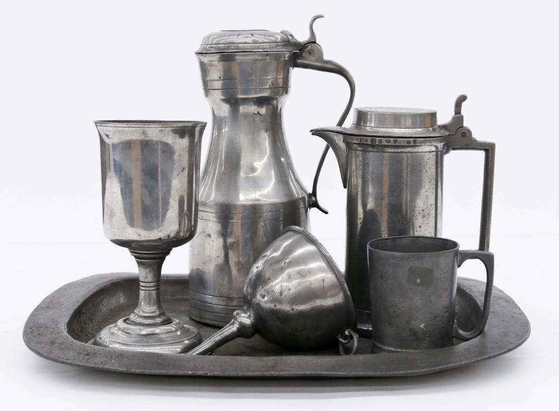 Collection of Early Continental Pewter Articles.: Collection of Early Continental Pewter Articles. Includes a tall Scottish Tappet tankard 11'', a French hallmarked tankard 8'', an English Communion Chalice 8'', an English wine funnel 6'', a mug 3.5'