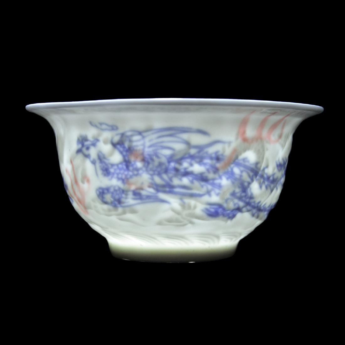 Ming Dynasty, White-Glazed Anhua Inside Decorated: 明 甜白釉内府暗刻龙凤青花红彩祭碗 (官)字款 口沿微撇，