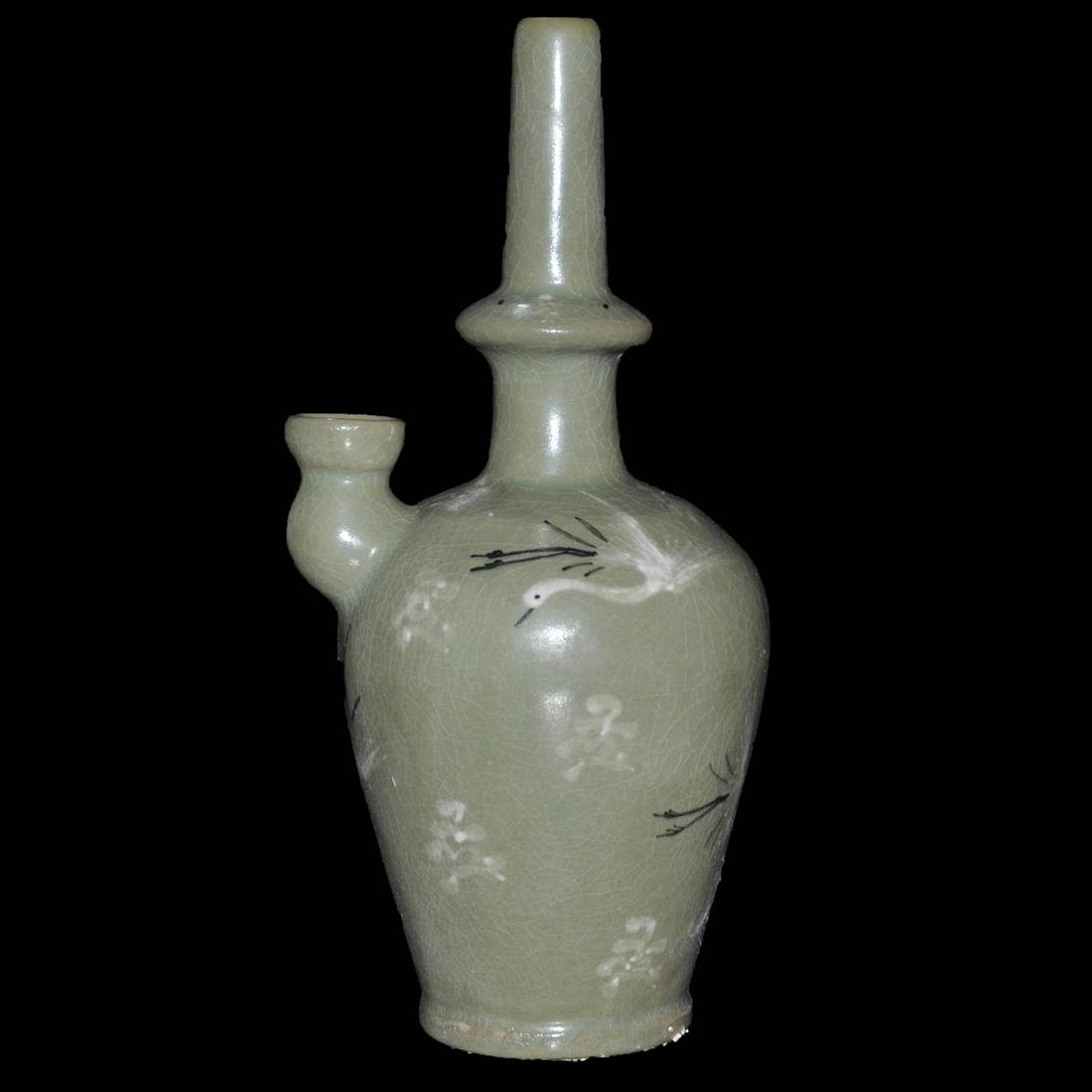 Korea, 19C Celadon Glazed Crane and Cloud Kendi Vase: 韩国 十九世纪 青釉云鹤纹净瓶 Korea, 19C Celadon Glazed Crane and Cloud Kendi Vase Height: 10⅞ in (27.6 cm)