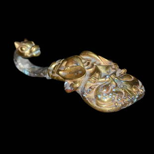 Warring States, A Gilt-Bronze Mask Garment Hook, Daigou: 战国 铜鎏金兽首龙纹带钩