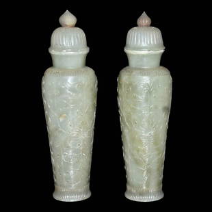 Ming Dynasty, A Pair of Fine and Rare Celadon Jade Vase: 明 青玉痕都斯坦浮雕缠枝花卉菊瓣纹盖尊一对