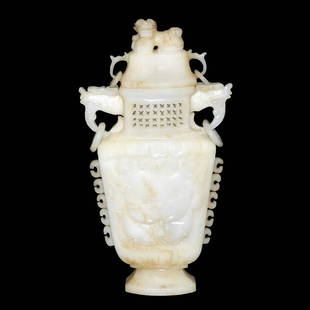 Han Dynasty, A White Jade Flask with Taotie Masks: 汉 白玉镂雕人面兽首出戟龙耳活环兽盖扁瓶