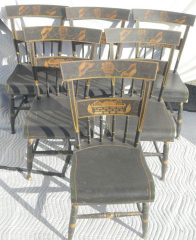 6 New Eng. Stenciled Hitchcock Chairs: Set of Six New England Stenciled Half Spindle Hitchcock Chairs Rolled plank seats, turned post legs, curved backs, original floral and basket stenciling. Circa 1820. 33 1/2" tall x 15 1/2"wide x 14 1/