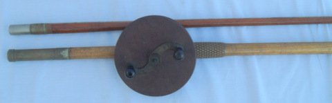 Bamboo Trolling Rod W/G Ritter Reel: Choice Faceted Bamboo Trolling Rod With Gustave Ritter 1880s Wooden Reel Hexagonal faceted tapered 10' bamboo rod, agate line guide completed with carved oak handle, brass furniture. 6 1/4" diameter w