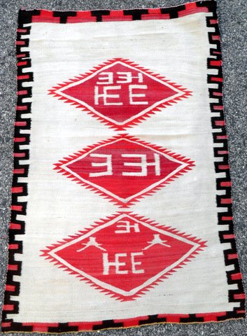 Southwest Navajo Rancher's Blanket: Rare Southwest Navajo Rancher's Blanket Off white background,three diamond lozenges, continuous geometric border. We have been told symbols inside lozenges are more than likely rancher's branding mark