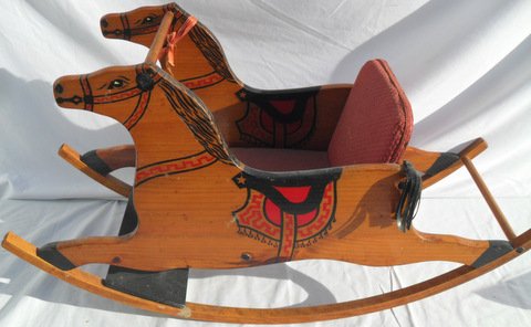 Child's Shoe Fly Wooden Horse Rocker: Cut out stamped and painted horses mounted round rockers, original fabric seat, leather details. 34" long x 19" tall
