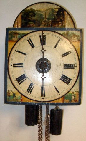 Weight Driven Wag On The Wall Clock: Early Continental 19th Century Weight Driven Wag On The Wall Clock Clock dates from 1830s era with time and strike movement. Features Black Forest lithograph scenes, Roman numeral dial, Arabic numeral