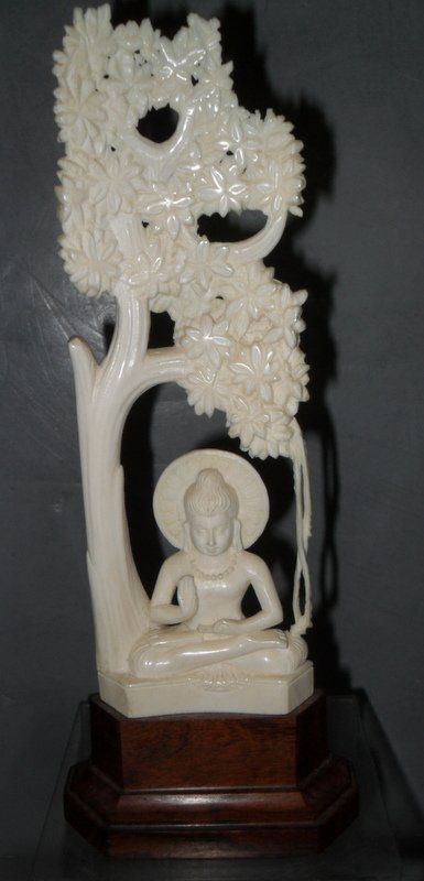 Intricate Ivory Goddess Carving & Stand: Exquisite Collector Quality Intricate Ivory Goddess Carving & Stand Superb quality oriental goddess in lotus position under intricately pierced carved lotus tree. 8 3/4" total height, ivory is 7" tall