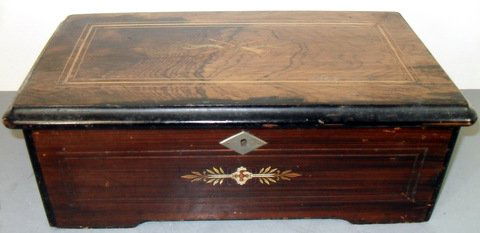 Vict. 6 Tune Brass Cylinder Music Box: Music box dating from 1880s era, 4 1/2" brass cylinder and comb mechanism. Original paper song card, original finish to exterior of case. 14 1/4" long x 8" x 5 1/2" tall