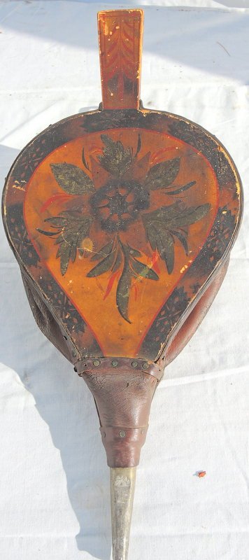 Pair of Rare Floral and Smoke Decorated Fireplace: Circa 1840's era features spade shape with tin air spout. Original leather floral decoration on face with geometric border/back yellow with black smoke accents. 18" long.