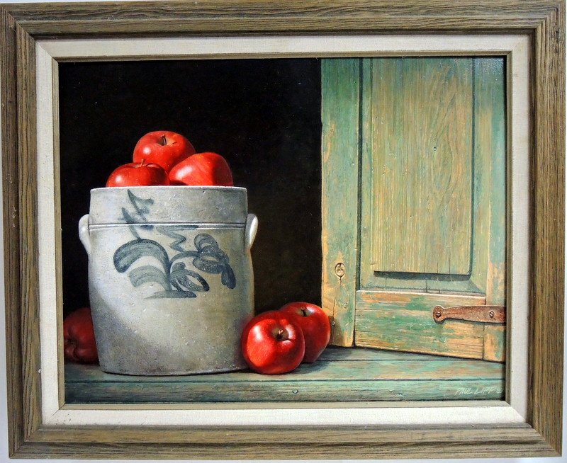Country Still Life Oil on Masonite - Paul Lipp (1937-): Connecticut artist, Paul Lipp, oil on masonite depicts country still life of apples in stoneware crock and cupboard door ajar. Superb realism. 18"x 14" Overall dimensions 23" x 18"