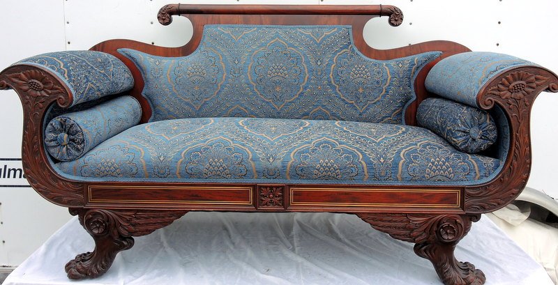 Rare Federal Rolled Arm Animal Paw Settee: Profusely carved with bold animal claw feet, floral and geometric faÃ§ade panels, bolstered rolled arms with expensive cut upholstery. Former owner paid over $5000 for restoration and upholstery.