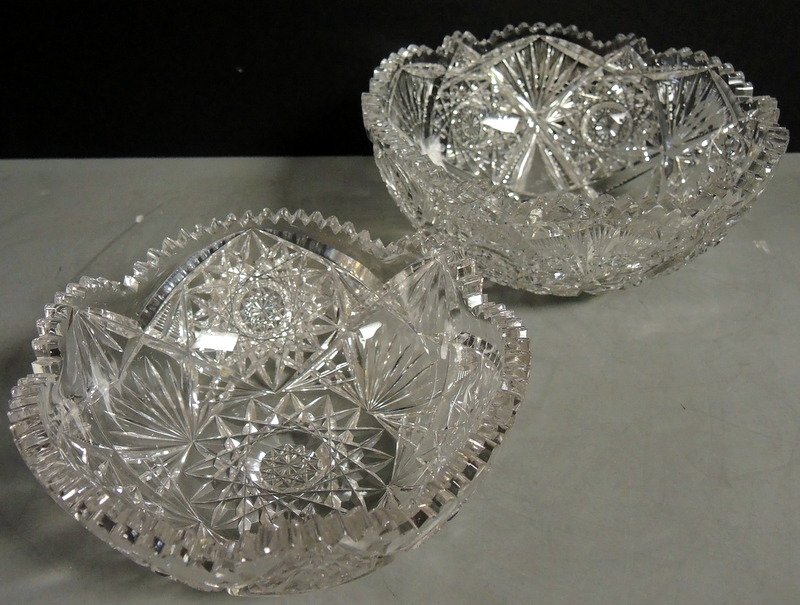 Two American Brilliant Period Cut Glass Center Bowls: Two hob star and fan pattern bowls. 9 1/4" and 8" diameter respectively.