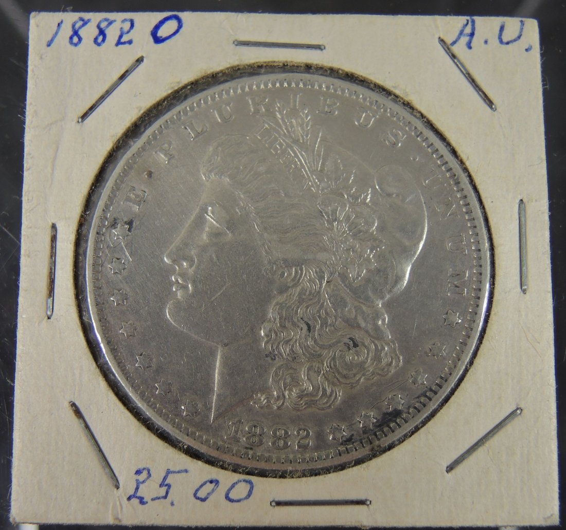 1882 O Silver Dollar: Estate coin AU quality.