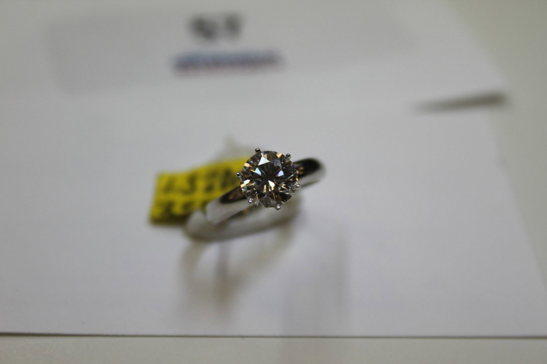 Solitaire DIA Ring: DIA 1.52 carat round cut with white gold band. EGL certificate with appraisal value estimate $27, 780.00 for stone. VS1 G color.