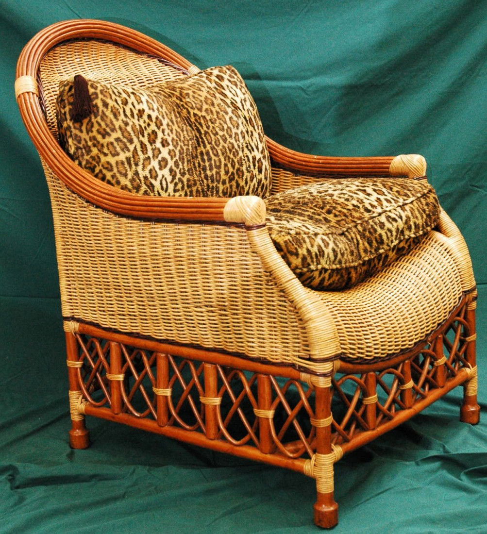 Rattan & Wicker Lounge Chair: Full Frame Rattan & Wicker Lounge Chair with Leopard pattern Cushions. Dimensions: 25.5"W x 28"D x 38.5"H