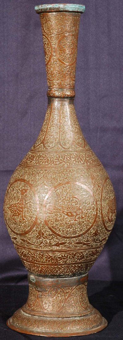 Antique Hammered Persian Copper Vase: Ornately hammered persian ornate copper vase. Embossed and engraved with geometrical motifs, birds and animals. 18.5" x 9".