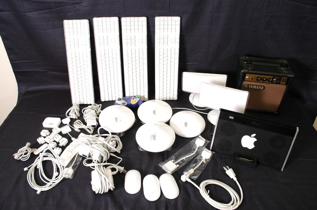 Collection of Misc. Apple Accessories: Wireless keyboards, speakers, USB cords, power supplies, Airport WiFi modems, wireless, Ipod speaker and various other Apple accessories.