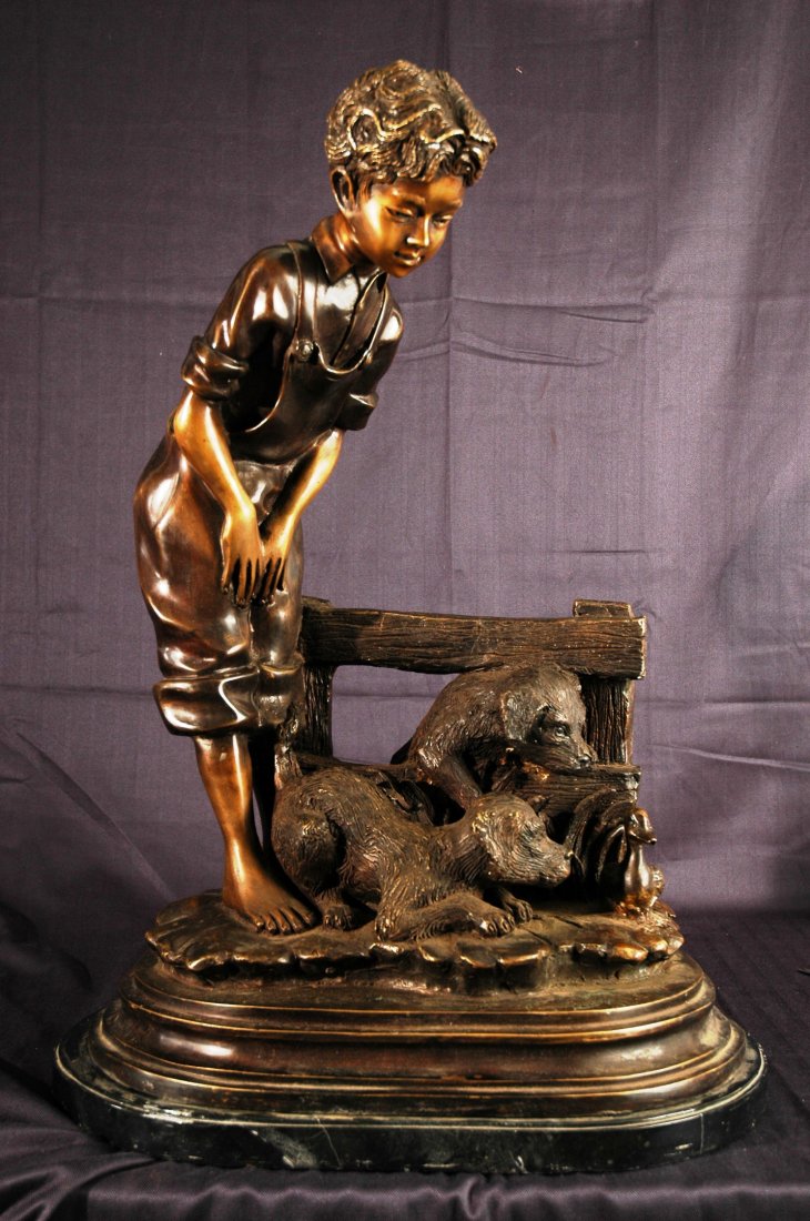 Bronze Boy Standing With Dogs on Marble Base: Bronze statue of boy standing with two dogs on marble base. Minor scratches from moving. 30" x 19"