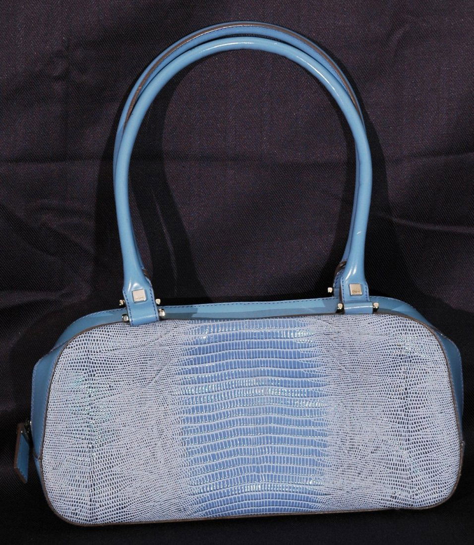 Salvatore Ferragamo Handbag: Previously used Salvatore Ferragamo Handbag leather with snakeskin print in baby blue. AB-21 1234 Made in Italy.