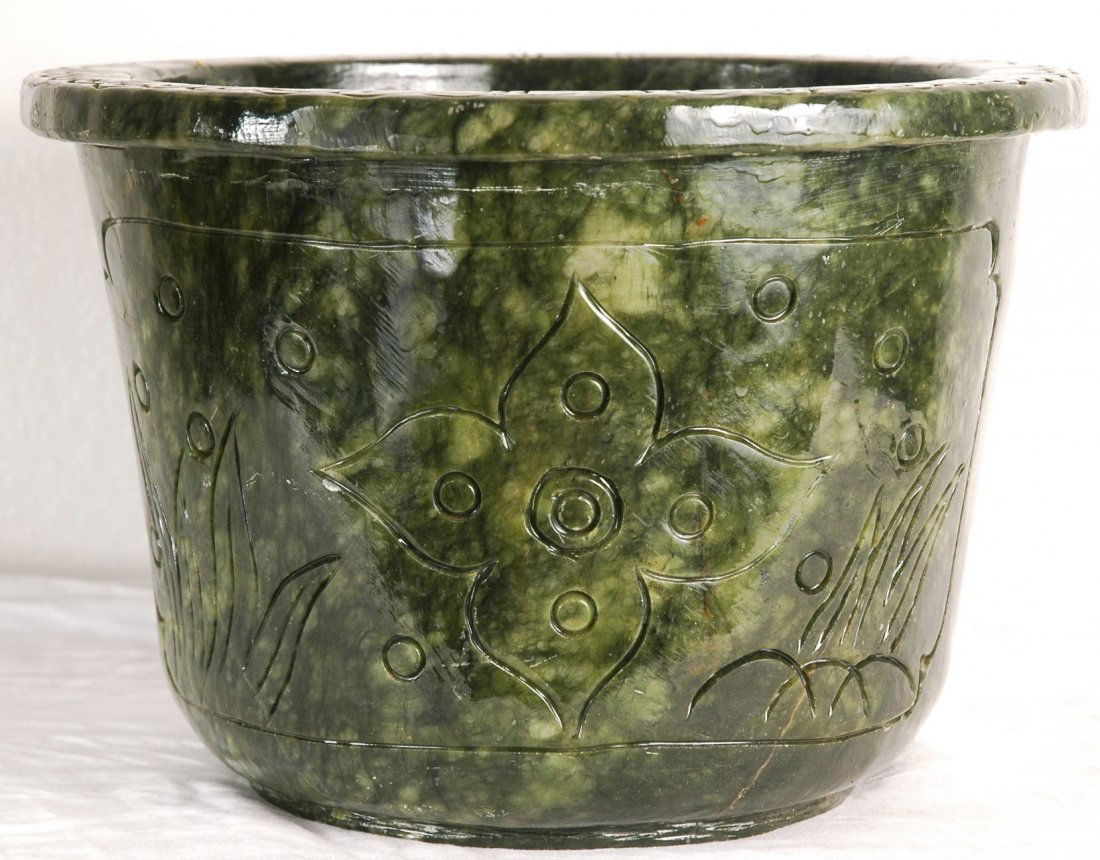 Stone Jade Bowl: Heavy planter/bowl made of stone jade. Green in color. with carved asian fish design. 89"H x 12"D