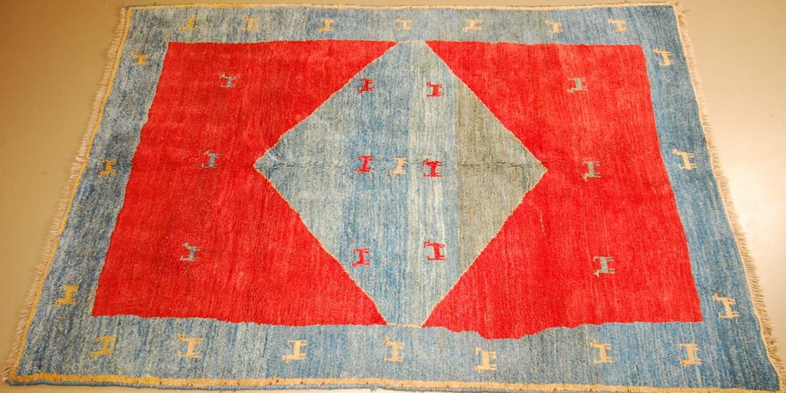 Hand Woven Tribal Nepal Rug 5'11" x 8'6": 5'11" x 8'6" hand woven rug, geometric red and blue design in wool.