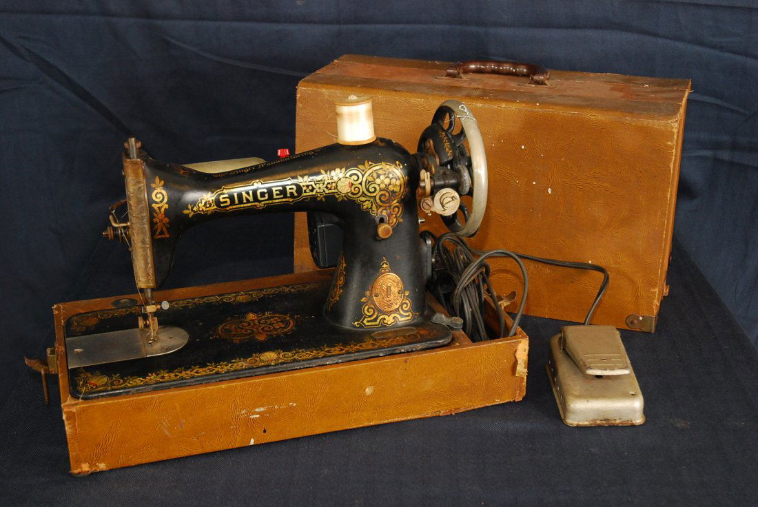 Antique Singer Sewing Machine: Antique Singer sewing machine with foot pedal. Serial Number G5387I08. 14" x 18" with carrying case. Circa late 1800s, Last patent date December 5th 1896. In good working condition.