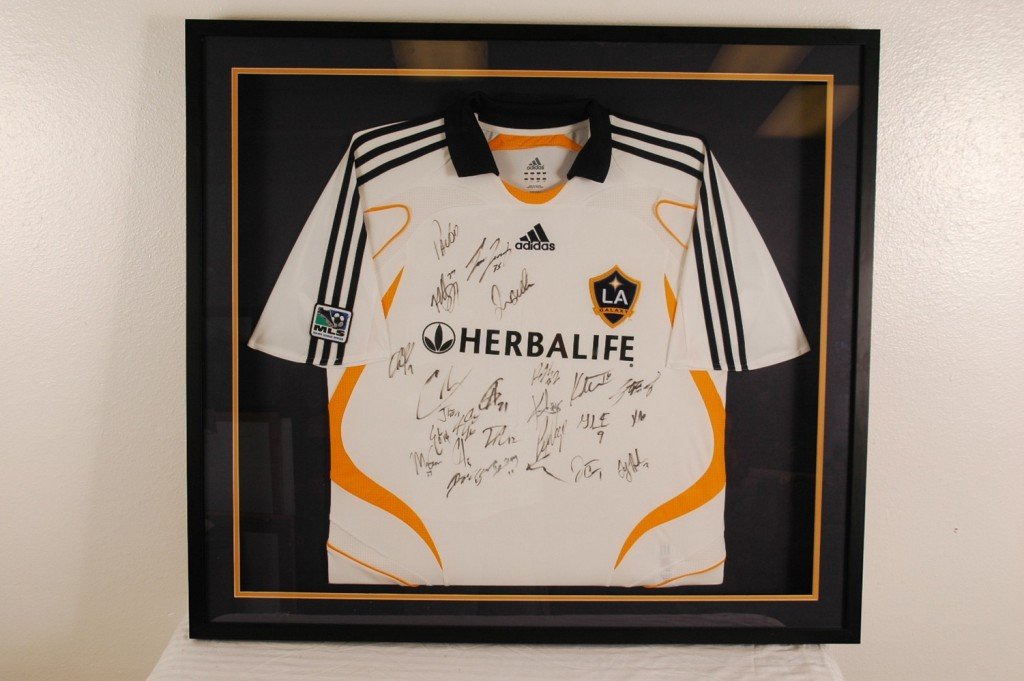 LA Galaxy 2009 Signed Team Jersey: LA Galaxy 2009 Signed Team Jersey, incluedes Cobi Jones, David Beckham, London Donovan and the rest of the team. Framed 37" x 33"