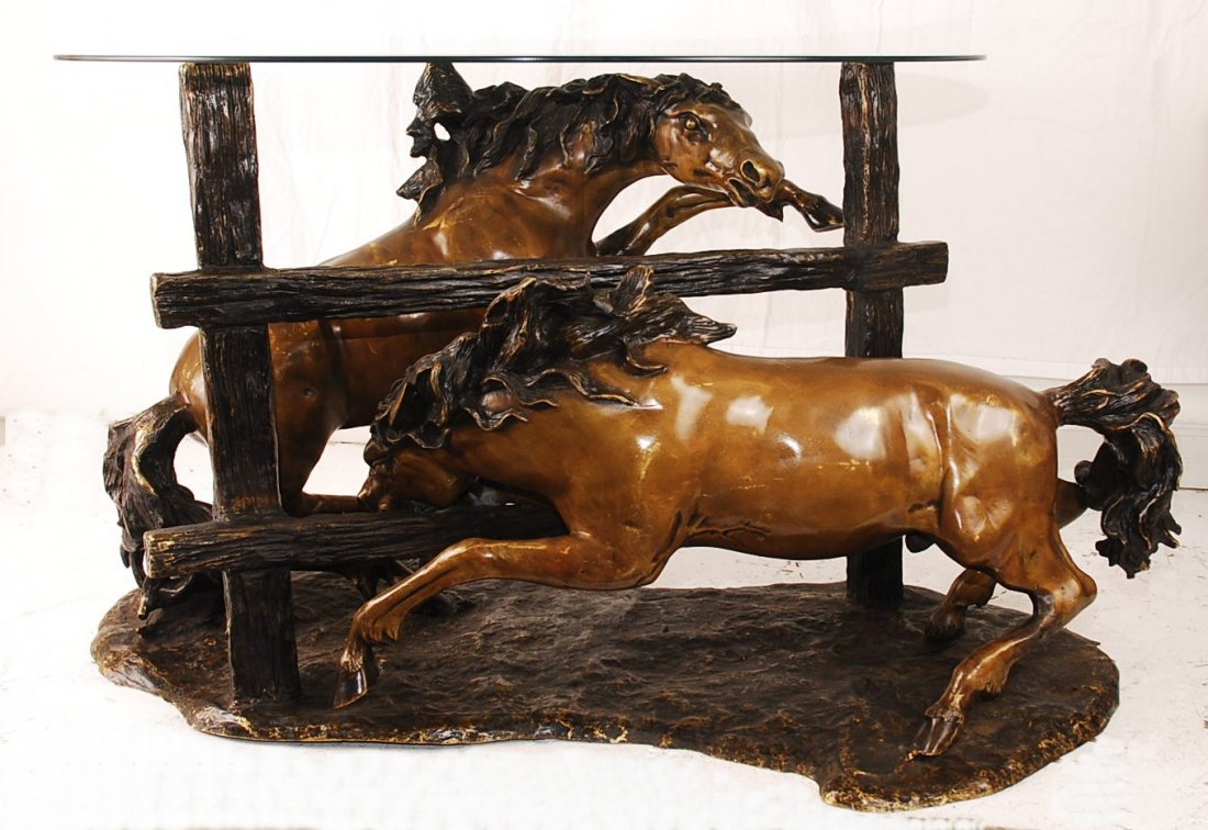 Bronze Table Base Of Two Horses 30"T x 53"L x 28"W: Bronze base of two horses on either side of a fence. Hold glass table top. Sold with glass.