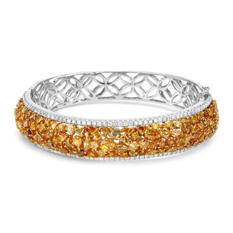 9.42 ctw Diamond Bangel 18K White Gold: The bangle bracelet featues a curvature of multi-color and multi-shaped diamonds accent by mirroring white diamond ribbons, supported by a lattice under gallery. The bangle bracelet is completed by hi