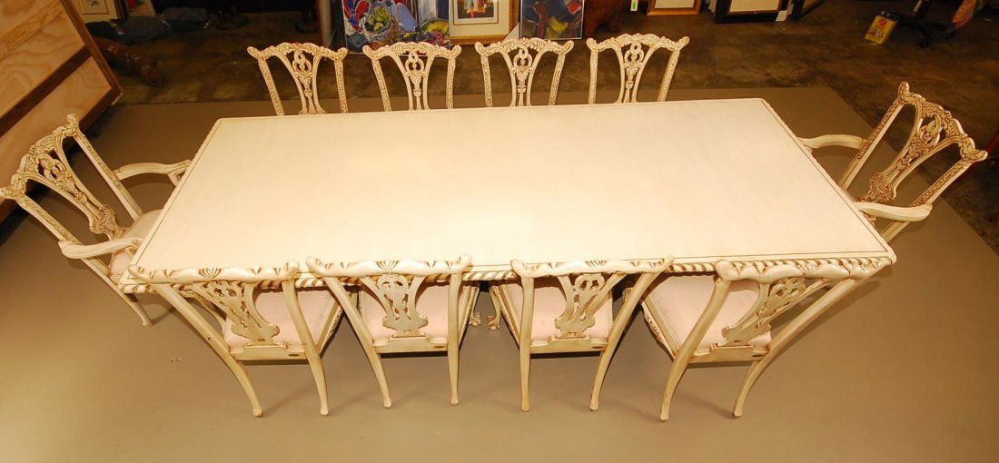 Chippendale 10 Seat Dining room set: Chippendale style10 seater dining room set. 3 pedestal base dining table 118" L x 48" W. Slight discoloration on upholstery, nicely finished in a custom antique white.