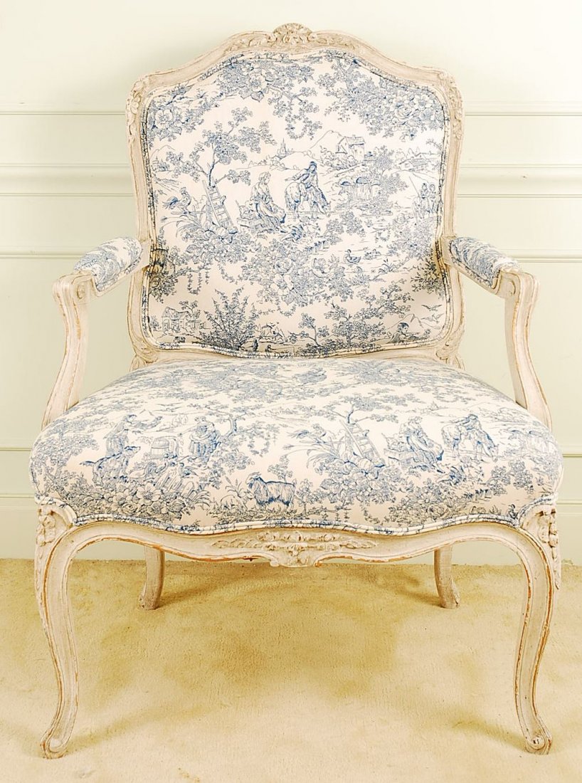 Vintage French Victorian Arm Chair: Vintage French Victorian Style Arm Chair, solid wood frame finish in antique white, Queen Ann legs, upholstered in blue print white fabric, dents all over. Dimensions: 27 1/2" W x 38"H x 21 1/2"D