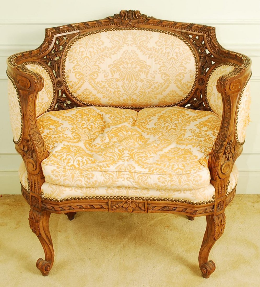Vintage Baroque Style Chair: Vintage Baroque Style Chair, solid wood hand carved frame, upholstered in floral design fabric and pewer nail head tream. Discoloration to the fabric. Size 33.5 W x 35"H x 20"D