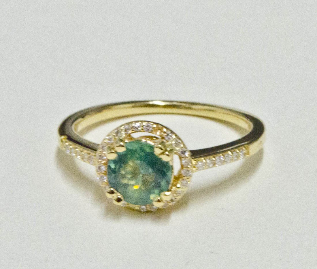 0.99 ct Alexandrite and Diamond Ring: 0.85 carats alexandrite and 0.14 carat diamond ring in 14K yellow gold totals 2.80 carats