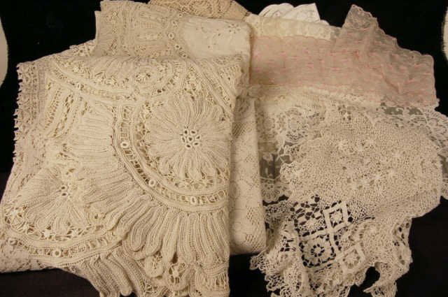 Lot of Vintage Lace & Crochet Table Cloths & Run: Lot of Vintage Lace & Crochet Table Cloths & Runners, place mats too. All in very good condition. The single table cloth was hand done by the grandmother of the estate. Some have soil marks, but most