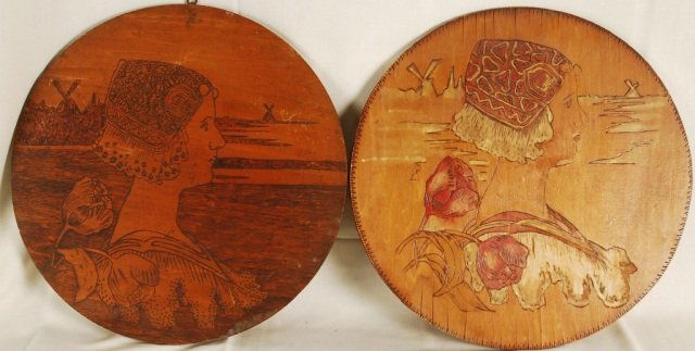 After Paul Berthon pair Wood Etchings: After Paul Berthon, pair of Wood Burning Etchings of Queen Wihelmina. Both panels are 18" across. Darker panel Is 1/2" thick and lighter panel is 5/16" thick. "Etta F, Cox 1906" stamped at back on one