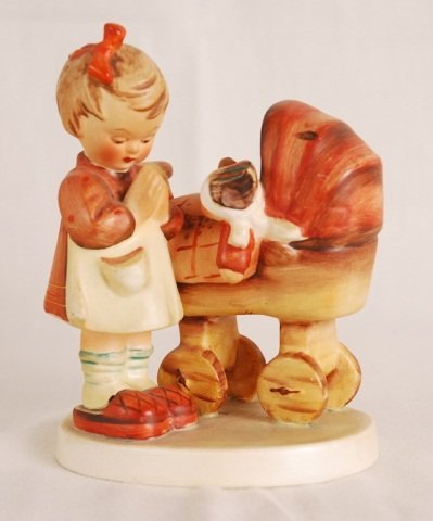 M.J. Hummel, Girl Praying by Stroller with Baby: M.J. Hummel, Girl Praying by Stroller with Baby Figurine. Made in Western Germany. Numbered 67.