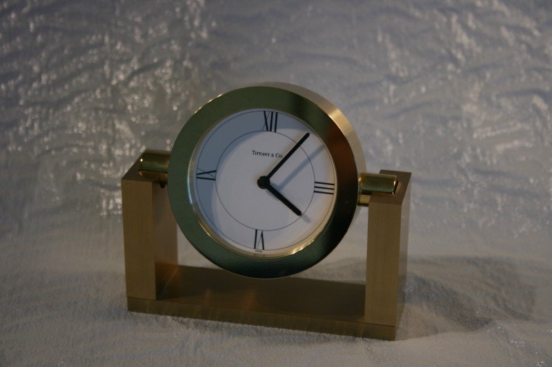 Tiffany & Co. Brass Desk Clock Circa 1989: weighs approximately 2 pounds, measures 5 inches wide, 4.5 inches tall