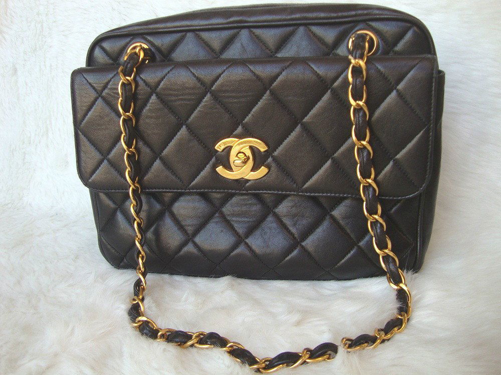 CHANEL Black Lamb Skin Shopper Bag Shoulder Bag: CHANEL Black Lamb Skin Shopper Bag Shoulder Bag GHW Turn Lock Pocket.One large turn lock flap pocket on the front. Single main compartment with 2 pockets. One slip pocket,one zipper pocket. SIZE W10.4