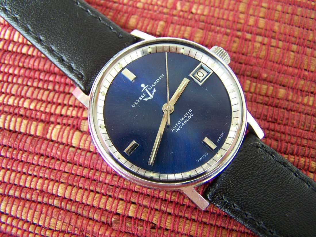 ULYSSE NARDIN BLUE SUNBURST DIAL AUTOMATIC: Size : 32mm large case aprox without crown, 16mm between lugs and 36mm from lug to lug Case : metal chromed, in good condition , with screw on back cover, see pictures Ulysse nardin hallmark inside Di