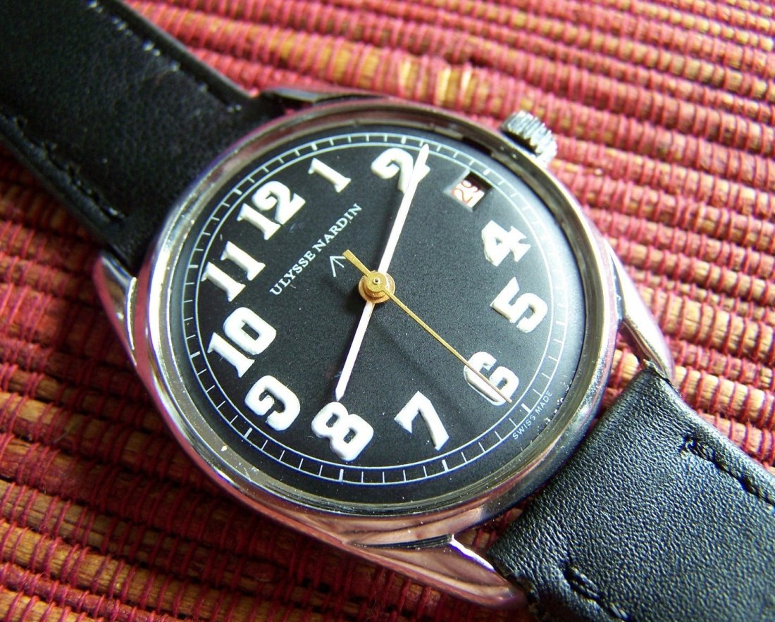 ULYSSE NARDIN DATE BLACK MILITARY DIAL: Size : 34mm aprox without crown, 18 mm between lugs and 42mm from lug to lug Case : Made of solid metal crhomed with snap on back cover, Dial : Black dial with Luminous arabic numbers to show time,sma