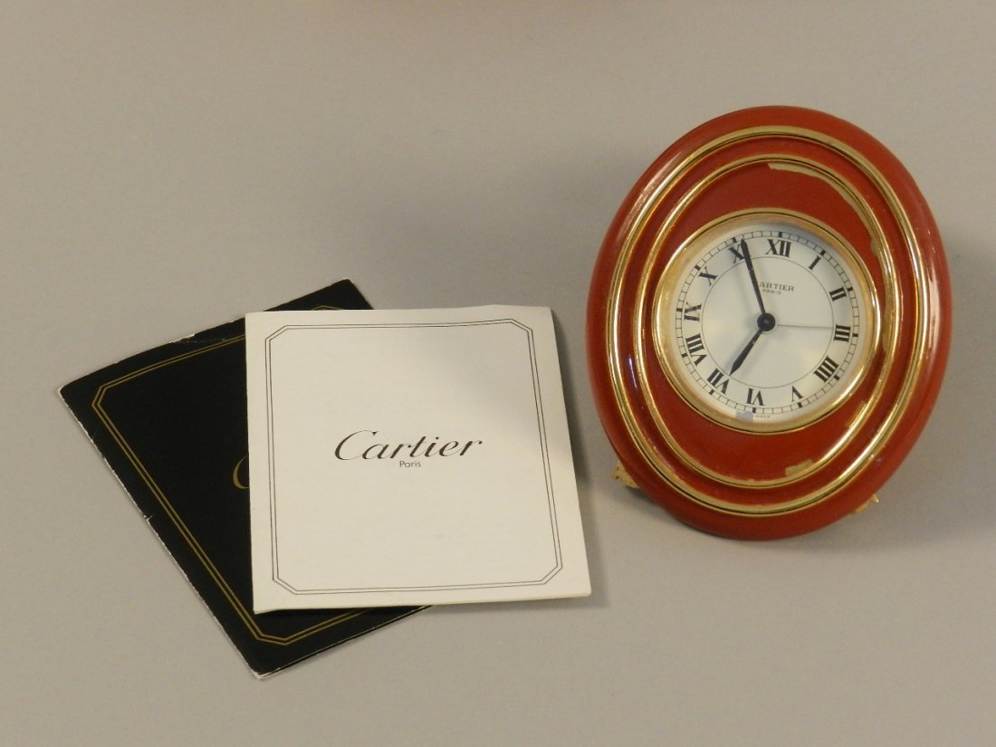 Cartier Red Enamel Desk Clock: Measures approx. 3 7/8" tall by 3 1/4" wide. Includes box and instructions.