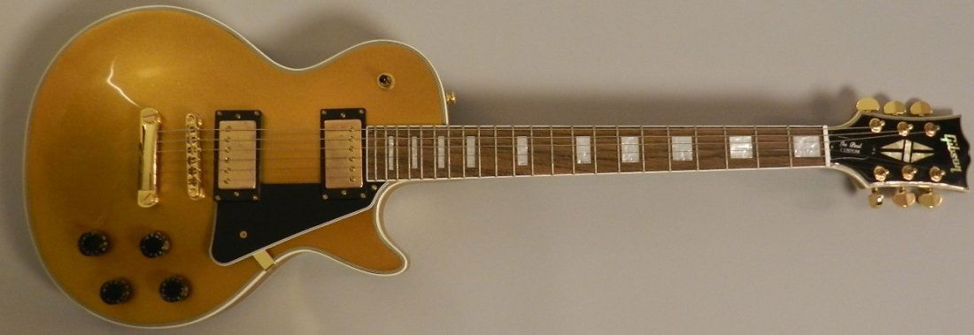 Gibson Style 1957 Les Paul Goldtop Reissue: Measures: 40 inches Made in USA, marked verso with model number Marked Gibson on handle Good working condition Looks identical to original 1957 Gold Top Sold as reproduction Gibson not made by Gibson