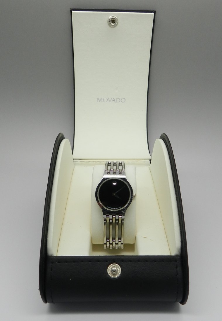 Ladies Stainless Steel Quartz Movado Watch: Includes original box, case & manual Model: 84 A11821