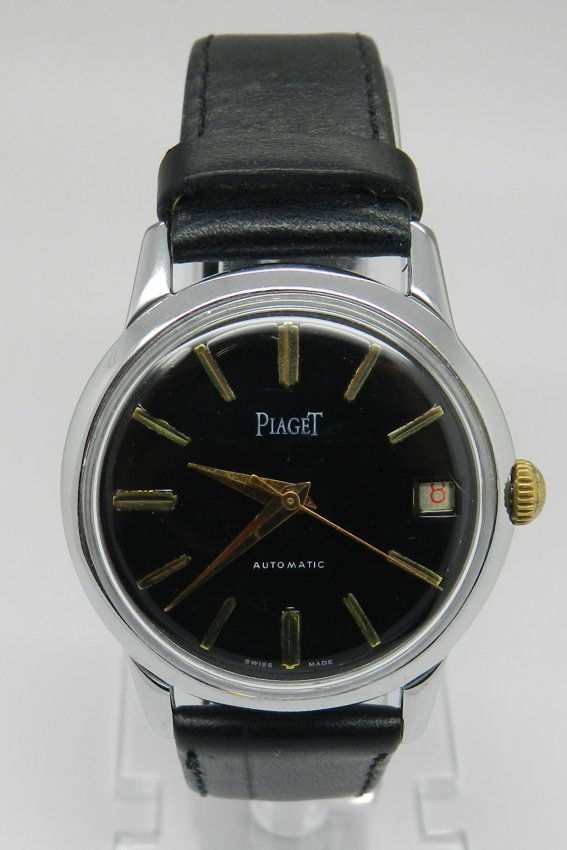 PIAGET BLACK DIAL BLACK LEATHER WATCH: Size : 34mm large case aprox with crown, 18mm between lugs and 41m from lug to lug