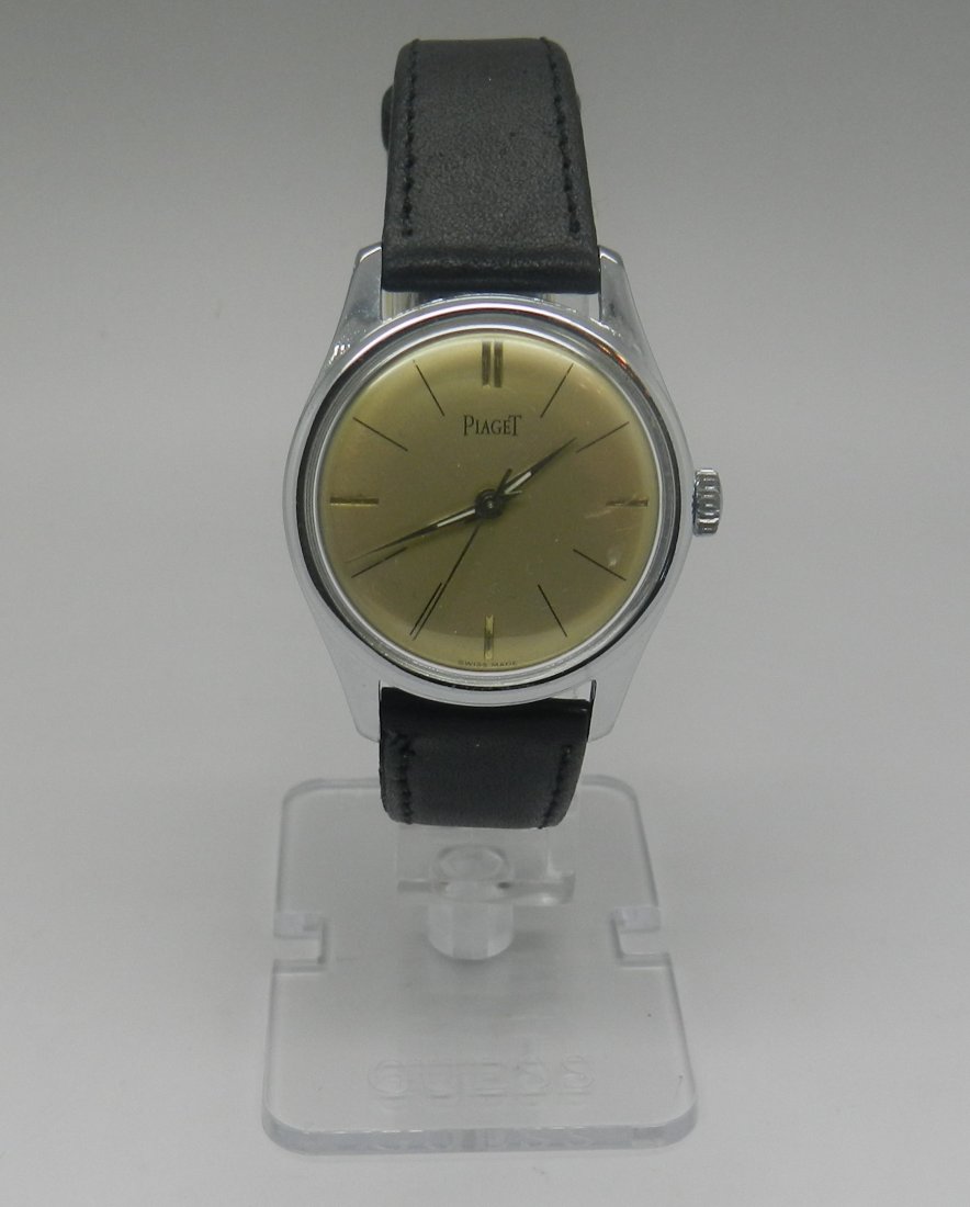 Vintage Piaget Men's Black Leather Watch: sunburst golden dial Size : 32mm/large case aprox without crown, 16mm between lugs and 38mm from lug to lug Manual wind watch