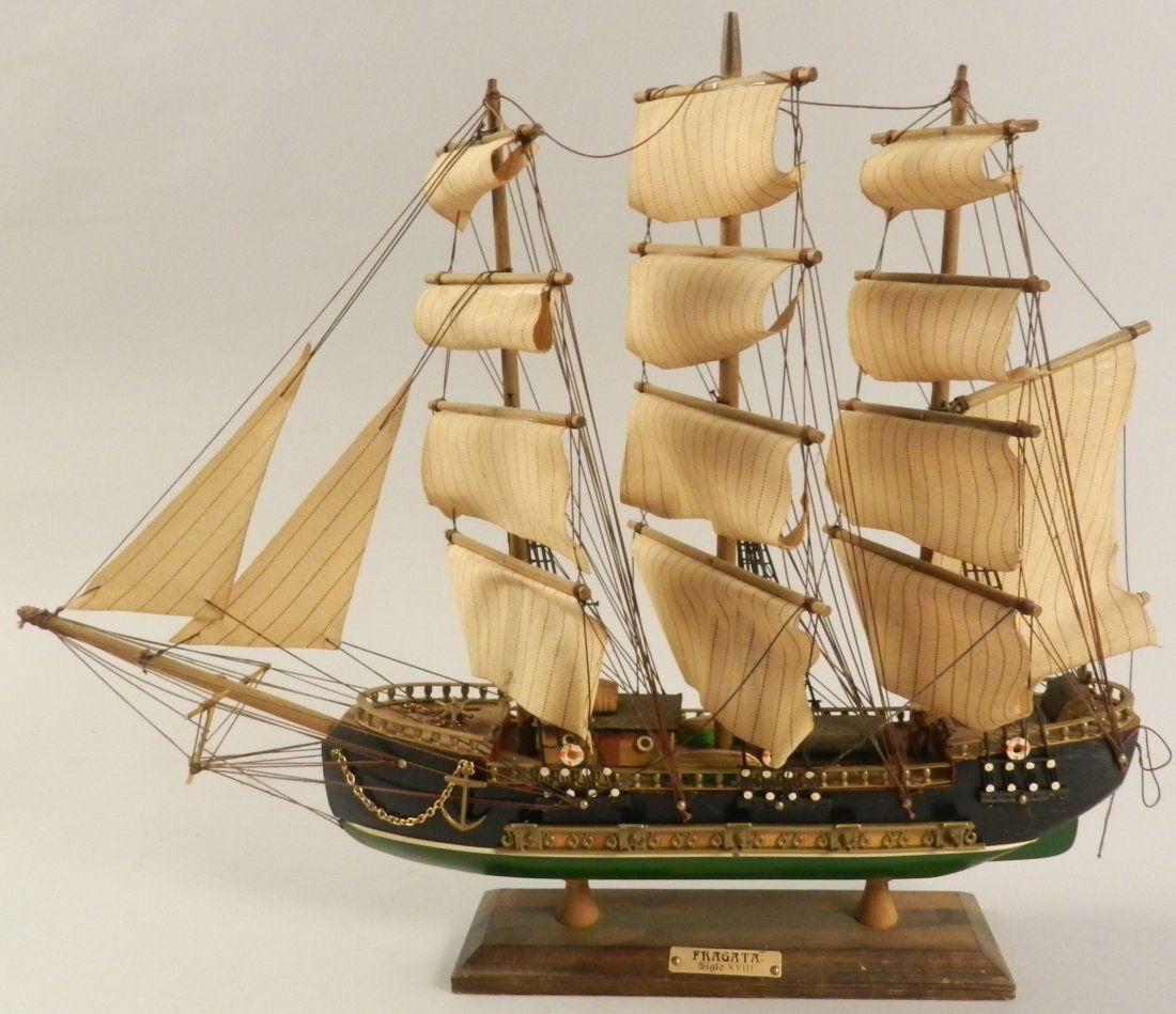 Antique Hand Crafted Wooden Sailboat Display: Measures: 17 inches in height, 20 inches long