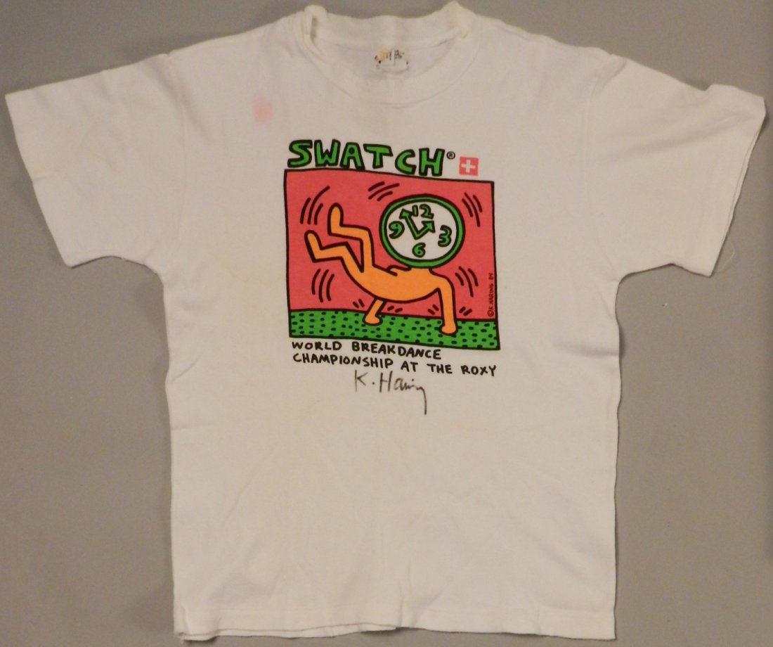 Keith Haring Hand Signed T-Shirt: Signed in black marker by Keith Haring Shirt measures: 23 x 17 inches