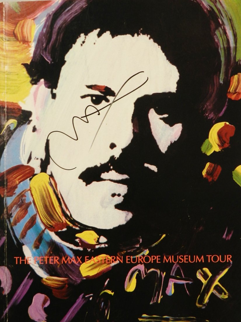 (2) Peter Max Marker Drawings: Measures: 11 x 8.5 inches 2 Signed drawings by Peter Max in a book additionally signed on cover page